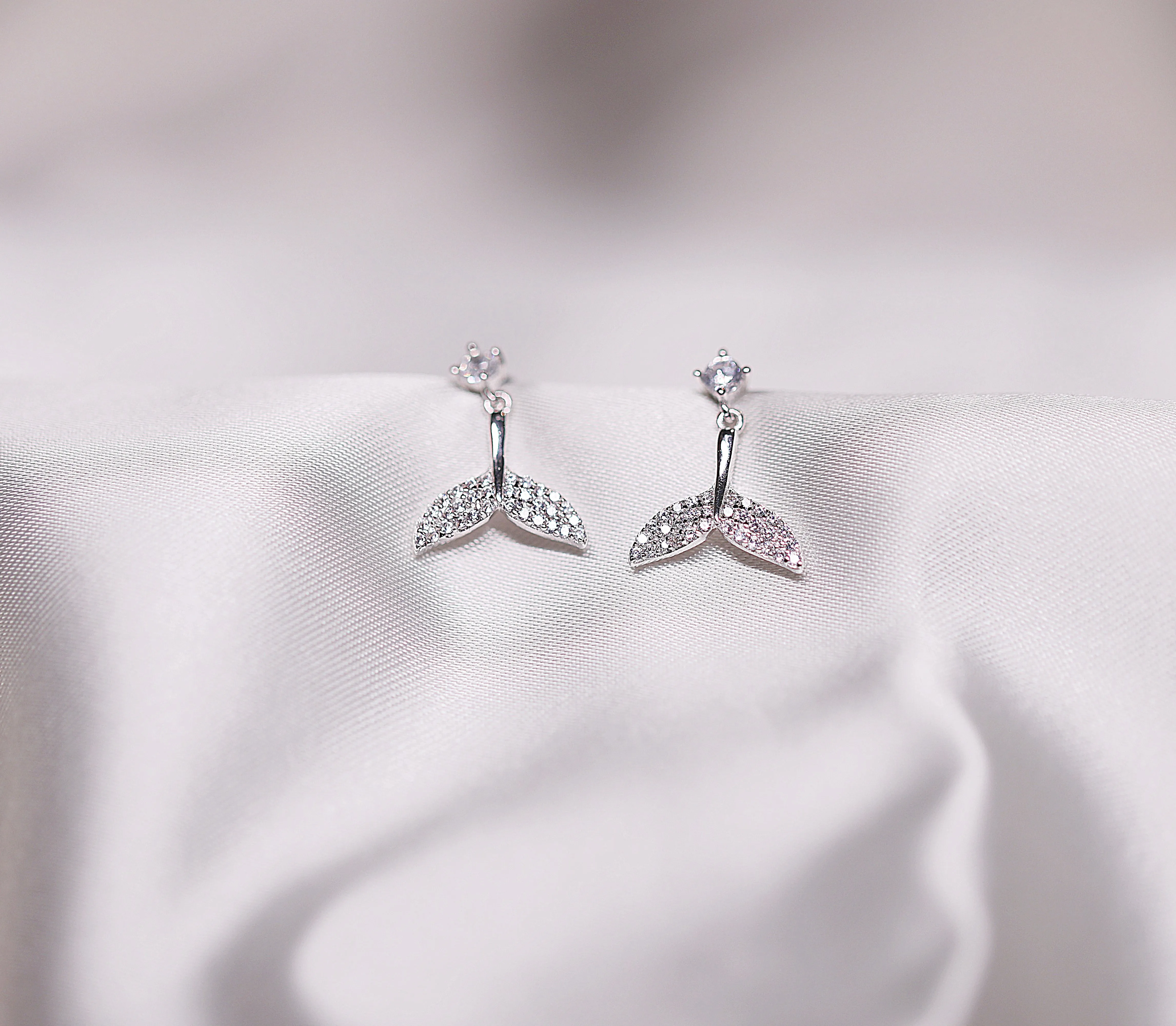 Dolphin tail drop earrings