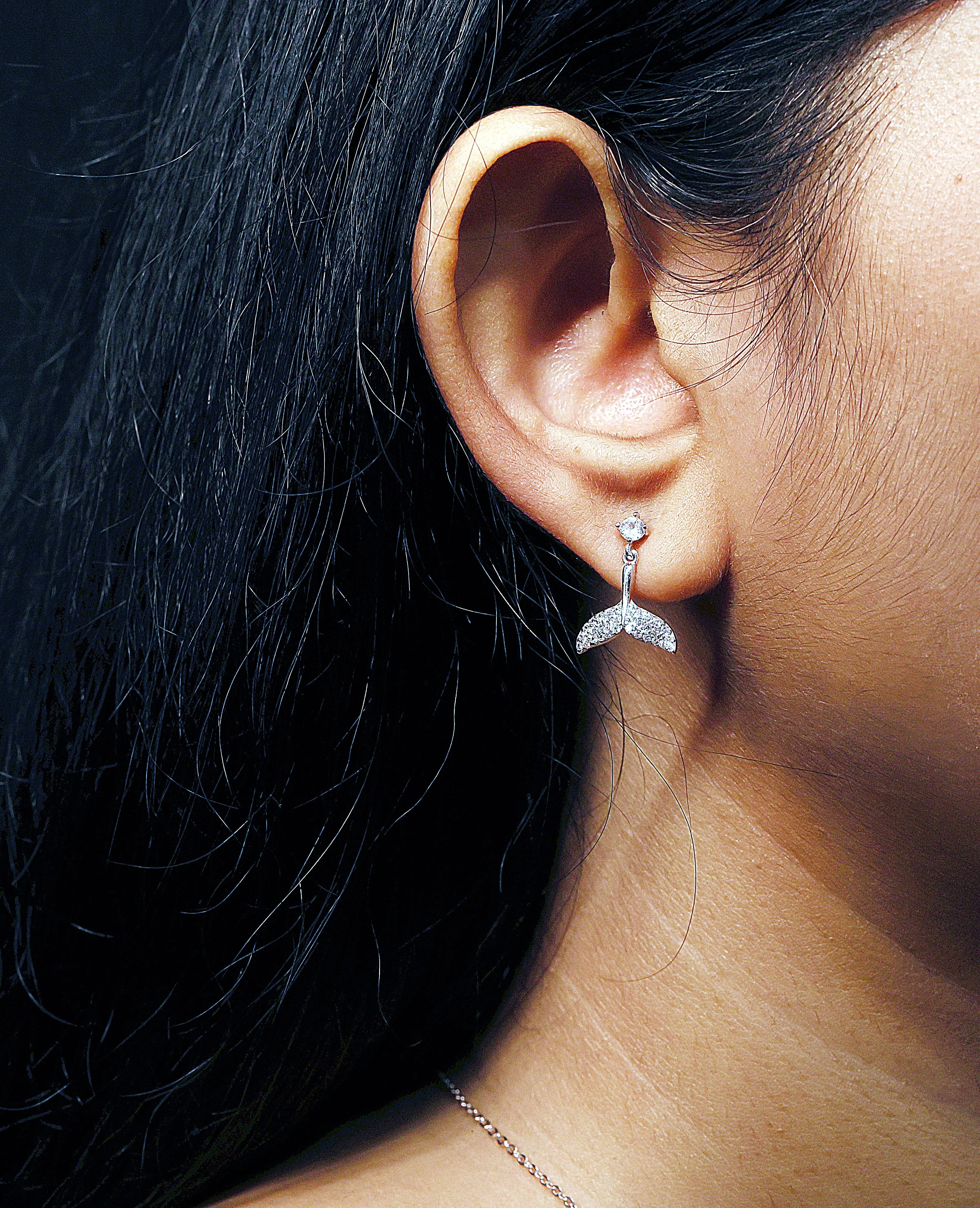 Dolphin tail drop earrings